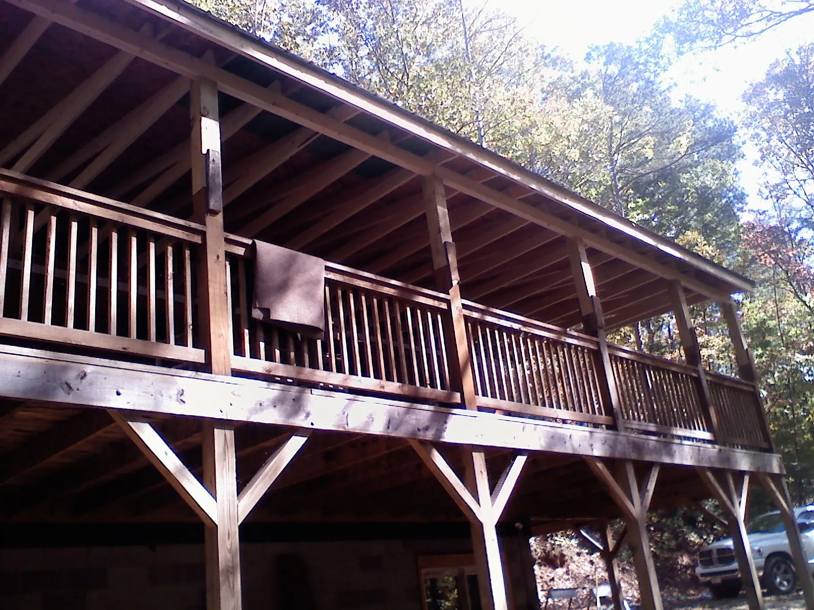 Timber framing under a new elevated porch and deck — Roof Leak Repair in Leon by Roofing Brothers